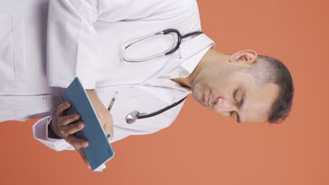 Vertical-video-of-Psychiatrist-doctor-taking-notes.
